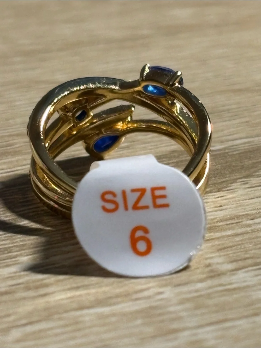 Gold Tone Blue & Clear Stone Wrap Ring – Size 6